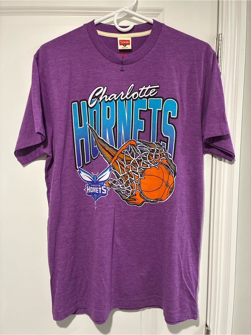 HOMAGE Purple Charlotte Hornets Graphic Tee with Blue and Orange Accents